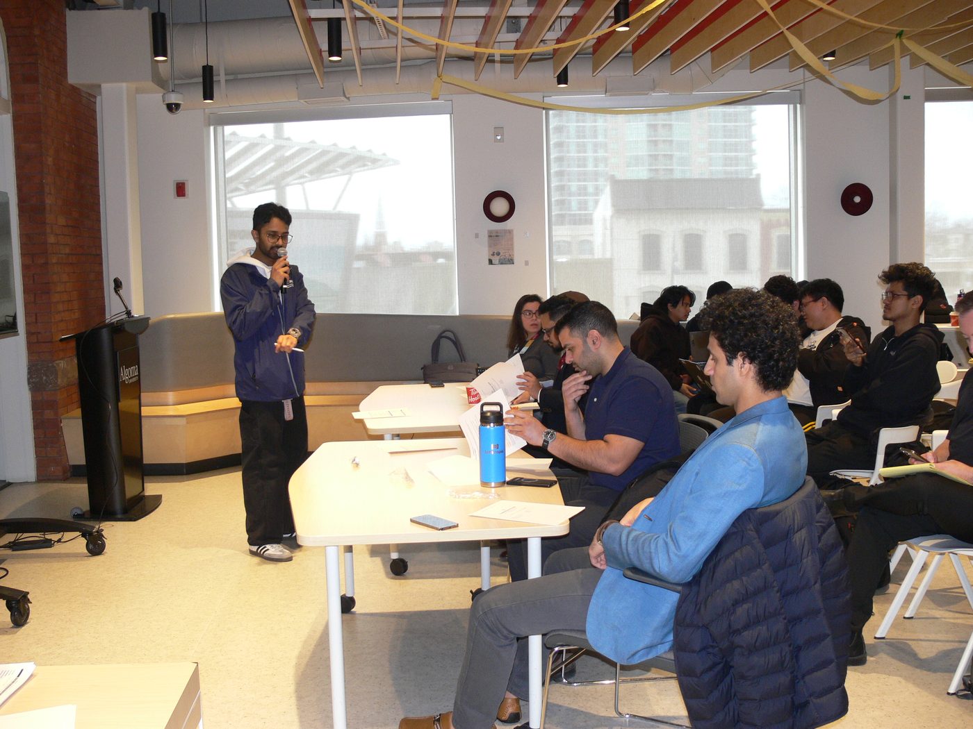 A team pitching to the judging panel at ThunderHacks, March 2026